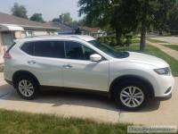 2015 Nissan Rogue · SV Sport Utility 4D