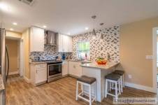 Better than new!!! 2 bed/2 bath/2 car garage plus den/office.